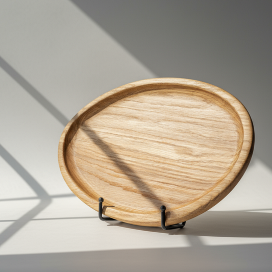 wooden tray in direct sunlight with a light gray background
