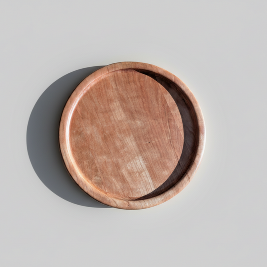 Wooden plate on a light gray background