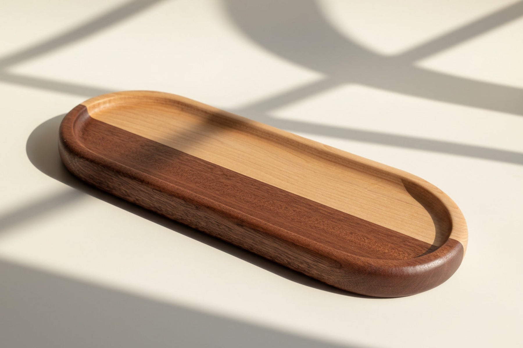 Wooden tray with a gradient finish on a light gray background