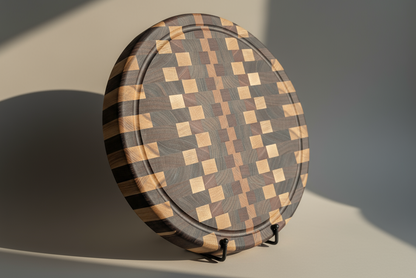 Round wooden cutting board with a checkered pattern on a neutral background