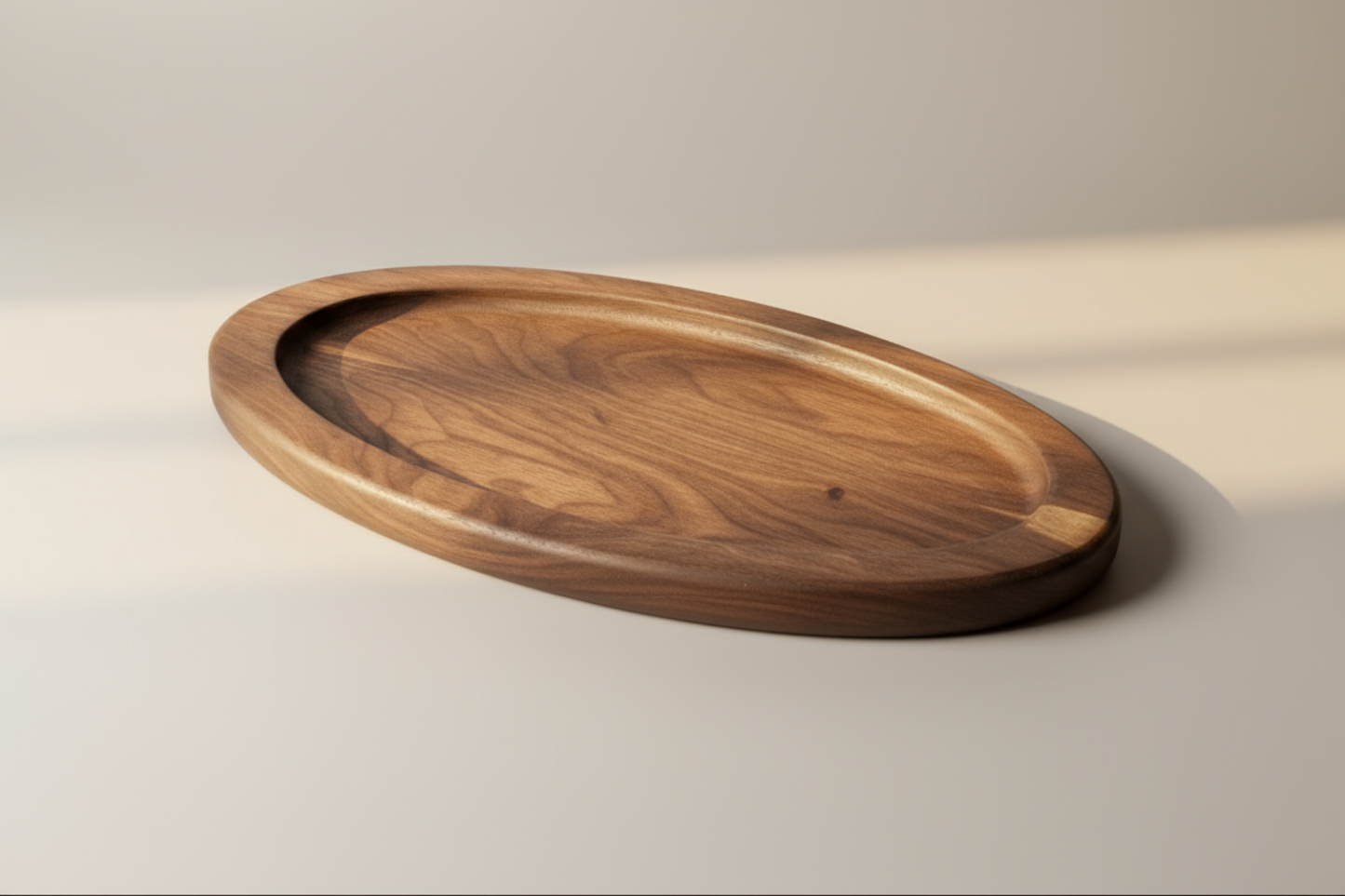 Wooden oval tray on a gray background