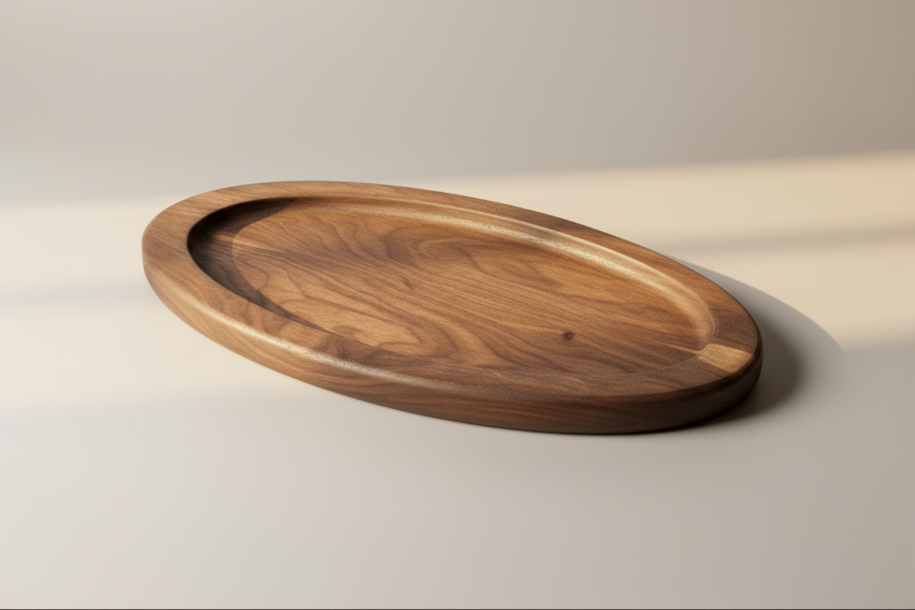 Wooden oval tray on a gray background