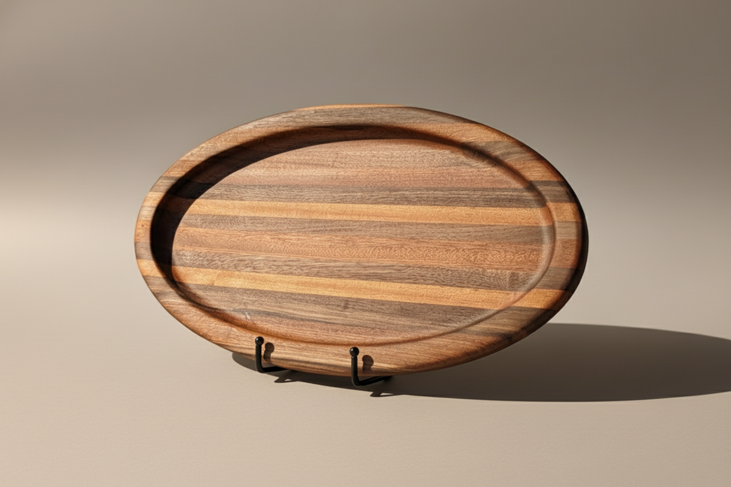 Wooden serving tray with a stand on a gray background