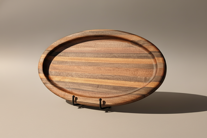 Wooden serving tray with a stand on a gray background